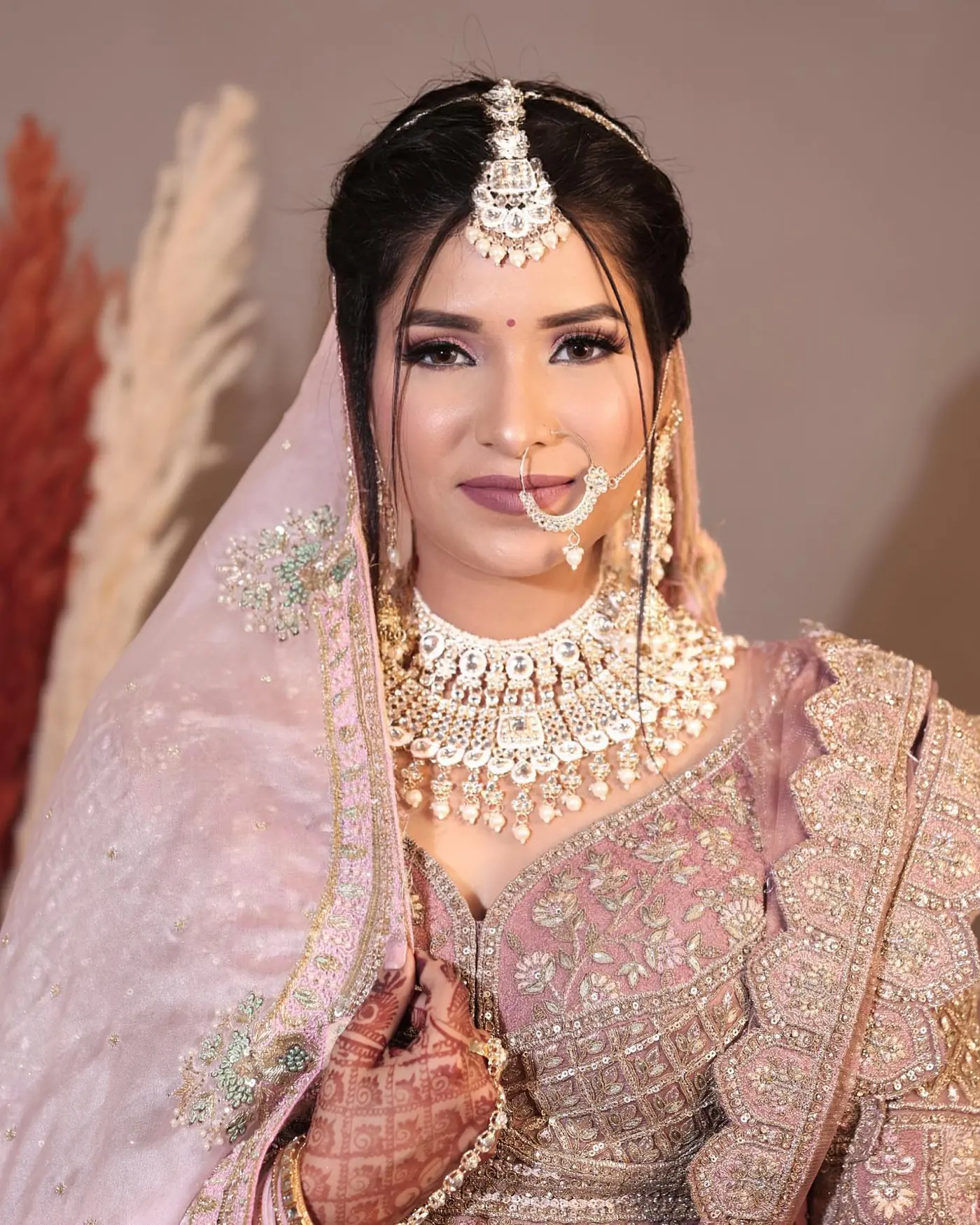 Blush Lehenga, Jhoomer Side Profile. Bridal makeup by Madhu Gupta at MG Makeovers, Gurugram